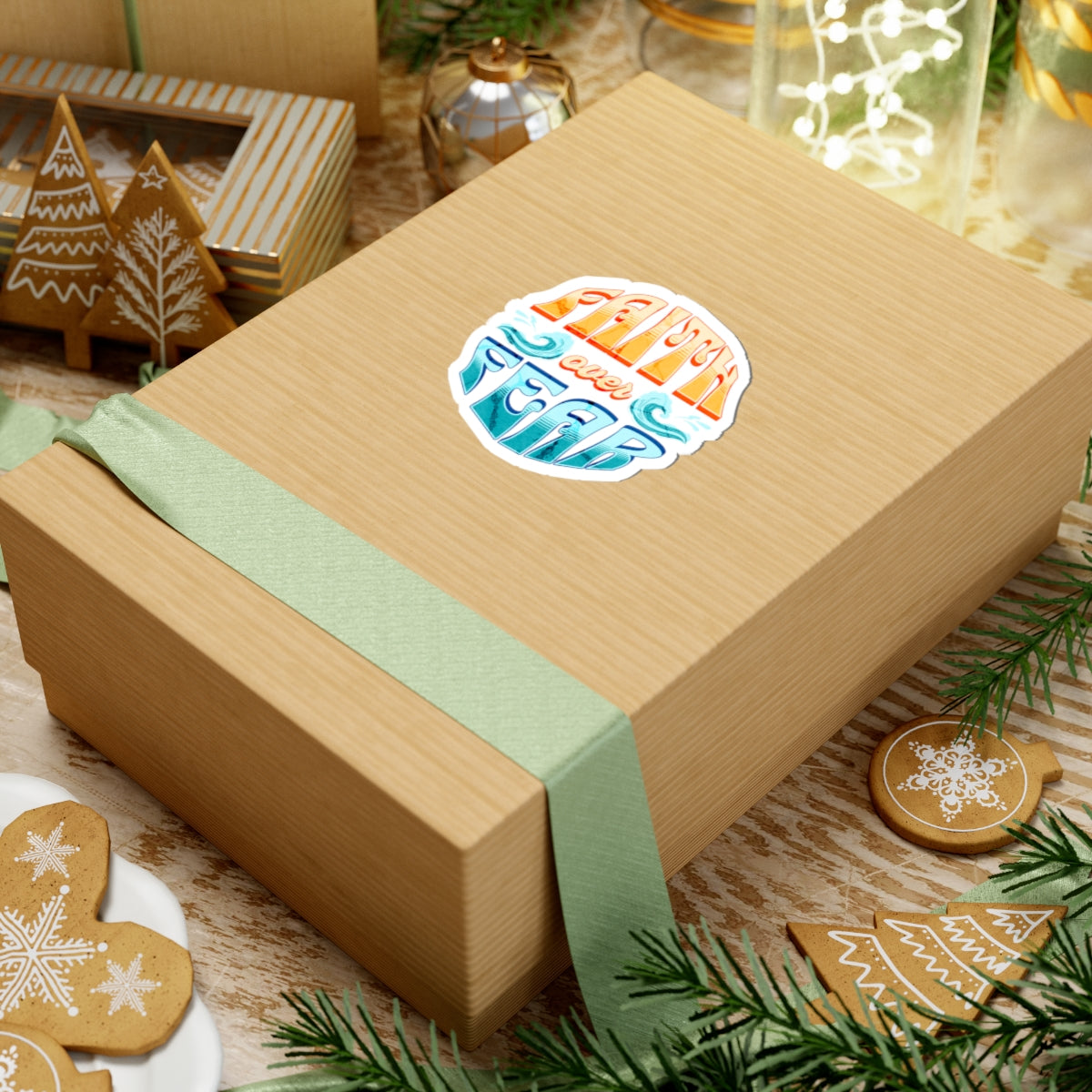 Wooden gift box with a decorative label on a festive background with cookies and greenery.