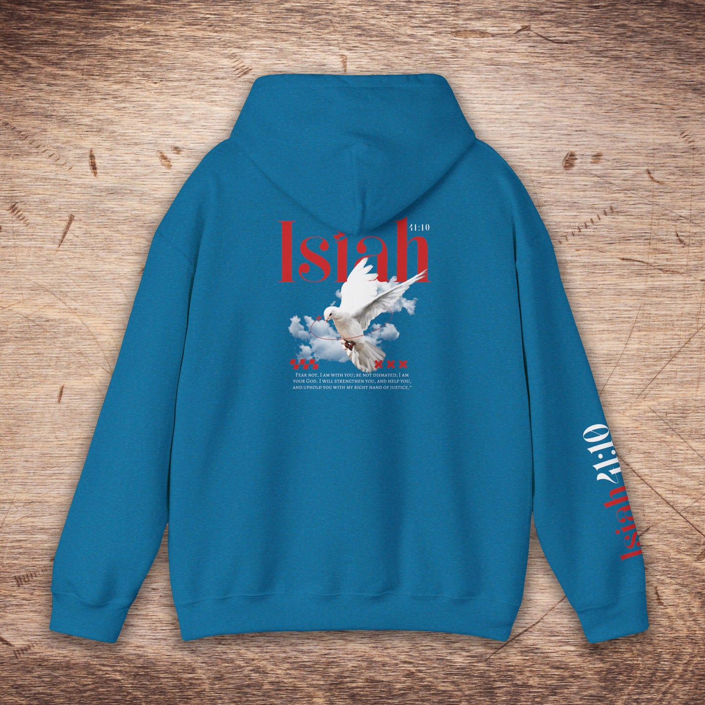 Blue hoodie with a graphic design on the back on a wooden surface