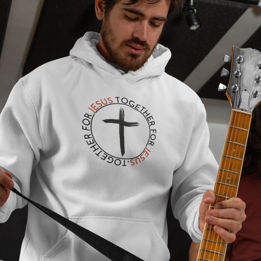 Man wearing a white hoodie with a cross design holding a guitar